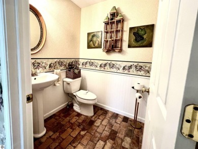 Discover unparalleled executive living perfectly situated on the on Traverse City Golf and Country Club in Michigan - for sale on GolfHomes.com, golf home, golf lot