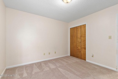 This 2-bedroom, 3-bath home, second row from the sound, offers a on The Country Club of the Crystal Coast in North Carolina - for sale on GolfHomes.com, golf home, golf lot