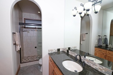 Wonderful ranch style home situated overlooking the 9th green in on The Golf Club At Redlands Mesa in Colorado - for sale on GolfHomes.com, golf home, golf lot