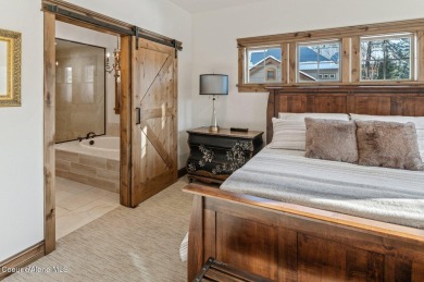 SPECTACULAR AND PRIVATE RETREAT SETTING AMONGST THE TREES IN on Hayden Lake Country Club in Idaho - for sale on GolfHomes.com, golf home, golf lot