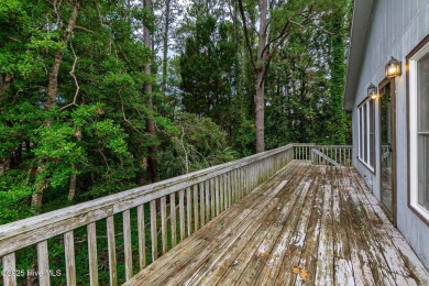 This 2-bedroom, 3-bath home, second row from the sound, offers a on The Country Club of the Crystal Coast in North Carolina - for sale on GolfHomes.com, golf home, golf lot