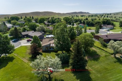 Situated on the ninth hole of the Olive Glenn Golf Course, 10 on Olive Glenn Golf and Country Club in Wyoming - for sale on GolfHomes.com, golf home, golf lot