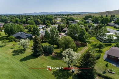 Situated on the ninth hole of the Olive Glenn Golf Course, 10 on Olive Glenn Golf and Country Club in Wyoming - for sale on GolfHomes.com, golf home, golf lot