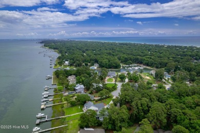 This 2-bedroom, 3-bath home, second row from the sound, offers a on The Country Club of the Crystal Coast in North Carolina - for sale on GolfHomes.com, golf home, golf lot