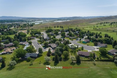 Situated on the ninth hole of the Olive Glenn Golf Course, 10 on Olive Glenn Golf and Country Club in Wyoming - for sale on GolfHomes.com, golf home, golf lot