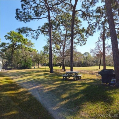 First floor condo ON THE GOLF COURSE in lovely Sugarmill Woods! on Sugarmill Woods Golf and Country Club in Florida - for sale on GolfHomes.com, golf home, golf lot