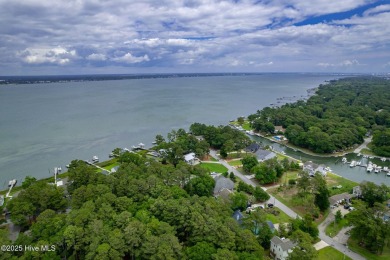 This 2-bedroom, 3-bath home, second row from the sound, offers a on The Country Club of the Crystal Coast in North Carolina - for sale on GolfHomes.com, golf home, golf lot