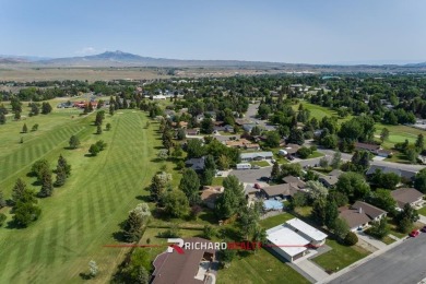 Situated on the ninth hole of the Olive Glenn Golf Course, 10 on Olive Glenn Golf and Country Club in Wyoming - for sale on GolfHomes.com, golf home, golf lot