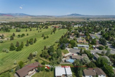 Situated on the ninth hole of the Olive Glenn Golf Course, 10 on Olive Glenn Golf and Country Club in Wyoming - for sale on GolfHomes.com, golf home, golf lot