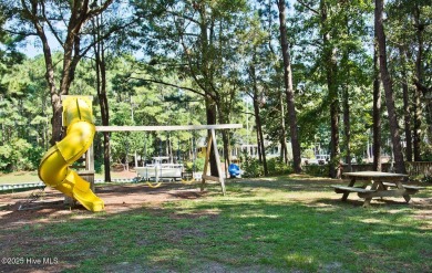 This 2-bedroom, 3-bath home, second row from the sound, offers a on The Country Club of the Crystal Coast in North Carolina - for sale on GolfHomes.com, golf home, golf lot