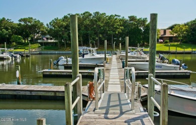 This 2-bedroom, 3-bath home, second row from the sound, offers a on The Country Club of the Crystal Coast in North Carolina - for sale on GolfHomes.com, golf home, golf lot