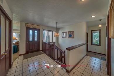 Situated on the ninth hole of the Olive Glenn Golf Course, 10 on Olive Glenn Golf and Country Club in Wyoming - for sale on GolfHomes.com, golf home, golf lot
