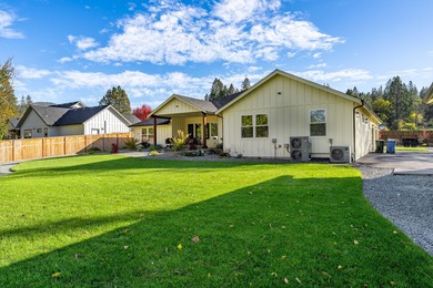 Rare single-level living on nearly an acre inside the city on Grants Pass Golf Club in Oregon - for sale on GolfHomes.com, golf home, golf lot