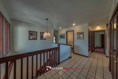 Situated on the ninth hole of the Olive Glenn Golf Course, 10 on Olive Glenn Golf and Country Club in Wyoming - for sale on GolfHomes.com, golf home, golf lot