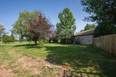Situated on the ninth hole of the Olive Glenn Golf Course, 10 on Olive Glenn Golf and Country Club in Wyoming - for sale on GolfHomes.com, golf home, golf lot