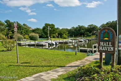 This 2-bedroom, 3-bath home, second row from the sound, offers a on The Country Club of the Crystal Coast in North Carolina - for sale on GolfHomes.com, golf home, golf lot