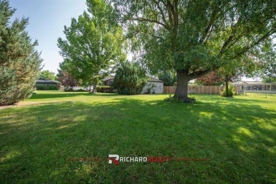 Situated on the ninth hole of the Olive Glenn Golf Course, 10 on Olive Glenn Golf and Country Club in Wyoming - for sale on GolfHomes.com, golf home, golf lot