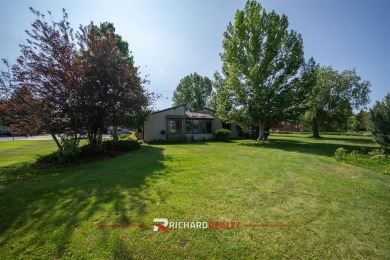 Situated on the ninth hole of the Olive Glenn Golf Course, 10 on Olive Glenn Golf and Country Club in Wyoming - for sale on GolfHomes.com, golf home, golf lot