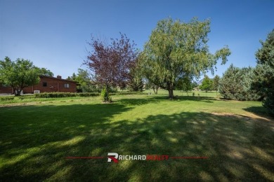 Situated on the ninth hole of the Olive Glenn Golf Course, 10 on Olive Glenn Golf and Country Club in Wyoming - for sale on GolfHomes.com, golf home, golf lot