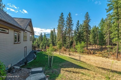 SPECTACULAR AND PRIVATE RETREAT SETTING AMONGST THE TREES IN on Hayden Lake Country Club in Idaho - for sale on GolfHomes.com, golf home, golf lot