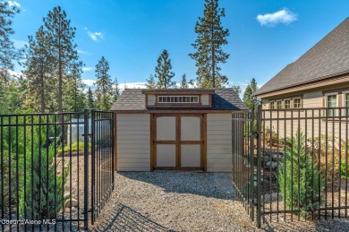 SPECTACULAR AND PRIVATE RETREAT SETTING AMONGST THE TREES IN on Hayden Lake Country Club in Idaho - for sale on GolfHomes.com, golf home, golf lot