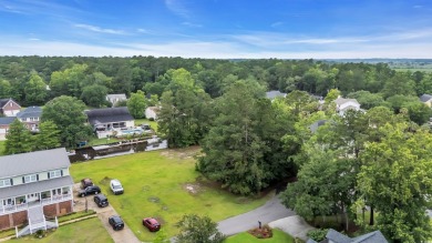 Discover the perfect blend of natural beauty and southern charm on Wedgefield Plantation Golf Club in South Carolina - for sale on GolfHomes.com, golf home, golf lot