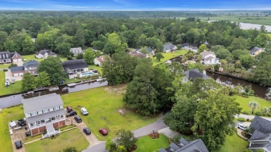 Discover the perfect blend of natural beauty and southern charm on Wedgefield Plantation Golf Club in South Carolina - for sale on GolfHomes.com, golf home, golf lot