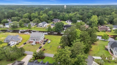 Discover the perfect blend of natural beauty and southern charm on Wedgefield Plantation Golf Club in South Carolina - for sale on GolfHomes.com, golf home, golf lot