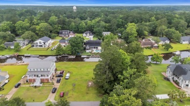 Discover the perfect blend of natural beauty and southern charm on Wedgefield Plantation Golf Club in South Carolina - for sale on GolfHomes.com, golf home, golf lot