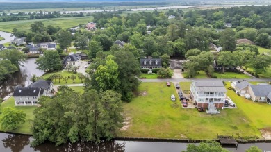 Discover the perfect blend of natural beauty and southern charm on Wedgefield Plantation Golf Club in South Carolina - for sale on GolfHomes.com, golf home, golf lot