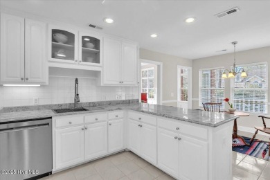 Charming brick home located in the gated community of Lockwood on Lockwood Folly Country Club in North Carolina - for sale on GolfHomes.com, golf home, golf lot