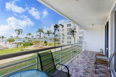 BAHIA VISTA'S BEST BUY! Enjoy beautiful water views from this on Isla Del Sol Yacht and Country Club in Florida - for sale on GolfHomes.com, golf home, golf lot