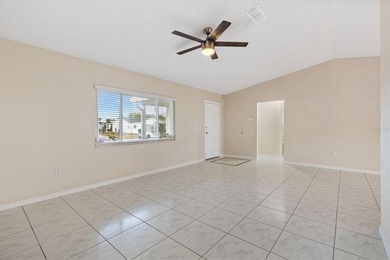 Welcome to a lifestyle where every day feels like a Saturday in on The Links of Spruce Creek in Florida - for sale on GolfHomes.com, golf home, golf lot