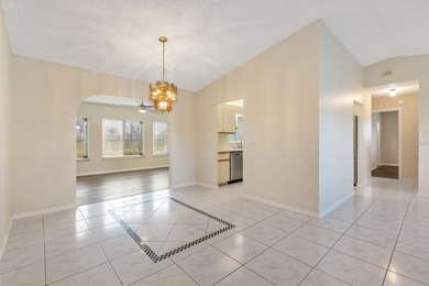 Welcome to a lifestyle where every day feels like a Saturday in on The Links of Spruce Creek in Florida - for sale on GolfHomes.com, golf home, golf lot