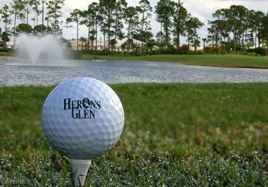 Welcome to this updated LaCornia model home in the heart of on Herons Glen Golf and Country Club in Florida - for sale on GolfHomes.com, golf home, golf lot