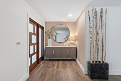 Welcome to this exquisitely renovated and designed 4-bedroom on Deer Creek Golf Club in Florida - for sale on GolfHomes.com, golf home, golf lot