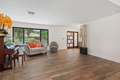 Welcome to this exquisitely renovated and designed 4-bedroom on Deer Creek Golf Club in Florida - for sale on GolfHomes.com, golf home, golf lot