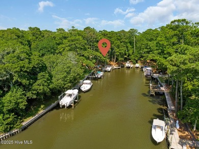 Discover the ultimate coastal lifestyle with this exceptional on The Country Club of the Crystal Coast in North Carolina - for sale on GolfHomes.com, golf home, golf lot