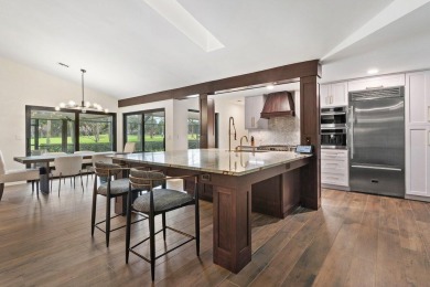 Welcome to this exquisitely renovated and designed 4-bedroom on Deer Creek Golf Club in Florida - for sale on GolfHomes.com, golf home, golf lot