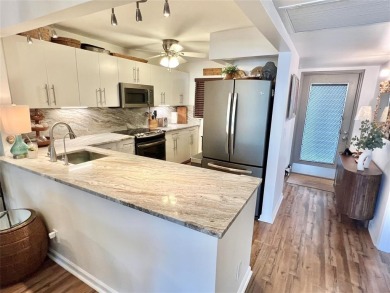 Absolutely beautifully remodeled 2 bedroom/2 bath condo located on Pine Island Ridge Country Club in Florida - for sale on GolfHomes.com, golf home, golf lot
