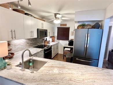 Absolutely beautifully remodeled 2 bedroom/2 bath condo located on Pine Island Ridge Country Club in Florida - for sale on GolfHomes.com, golf home, golf lot