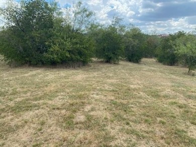 BUY NOW AND BUILD LATER.  This vacant lot is located in The on Tangle Ridge Golf Club in Texas - for sale on GolfHomes.com, golf home, golf lot