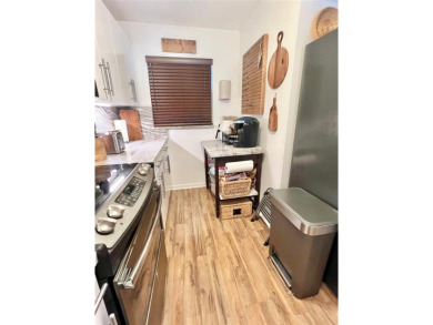 Absolutely beautifully remodeled 2 bedroom/2 bath condo located on Pine Island Ridge Country Club in Florida - for sale on GolfHomes.com, golf home, golf lot