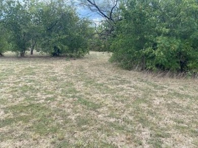 BUY NOW AND BUILD LATER.  This vacant lot is located in The on Tangle Ridge Golf Club in Texas - for sale on GolfHomes.com, golf home, golf lot