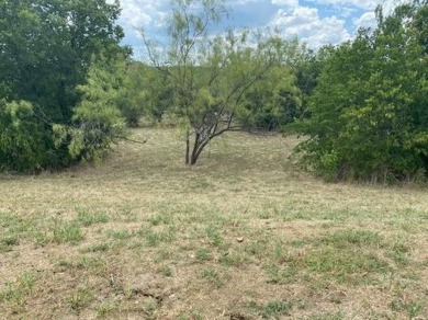 BUY NOW AND BUILD LATER.  This vacant lot is located in The on Tangle Ridge Golf Club in Texas - for sale on GolfHomes.com, golf home, golf lot