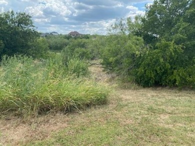 BUY NOW AND BUILD LATER.  This vacant lot is located in The on Tangle Ridge Golf Club in Texas - for sale on GolfHomes.com, golf home, golf lot