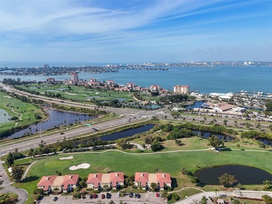 Palma Del Mar, is a waterfront complex located within Isla Del on Isla Del Sol Yacht and Country Club in Florida - for sale on GolfHomes.com, golf home, golf lot