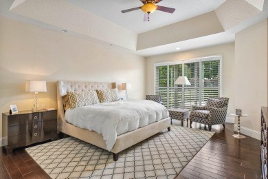 Stunning, two-story 4 BD 4 BA plus office home with lake views on Woodfield Country Club in Florida - for sale on GolfHomes.com, golf home, golf lot