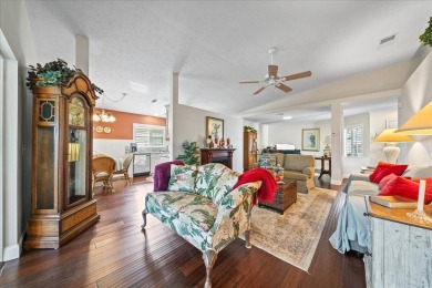 Morning coffee or evening cocktails on the enclosed lanai on Spanish Lakes Fairways in Florida - for sale on GolfHomes.com, golf home, golf lot