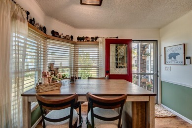 This great two-bed, two-bath home is located on the course at on Pine Lakes Country Club in Florida - for sale on GolfHomes.com, golf home, golf lot